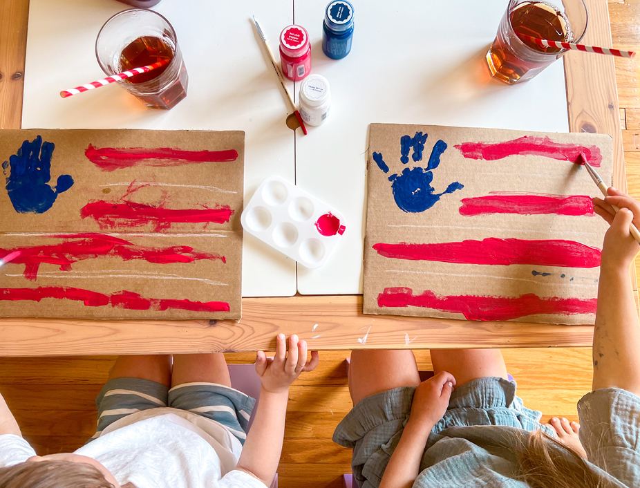 Using the red paint to add red stripes and make a flag